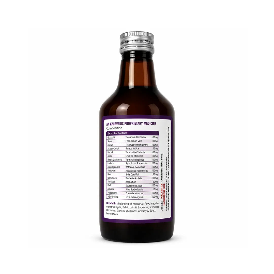 Bottle of Ayurvedic medicine with a purple label on a white background