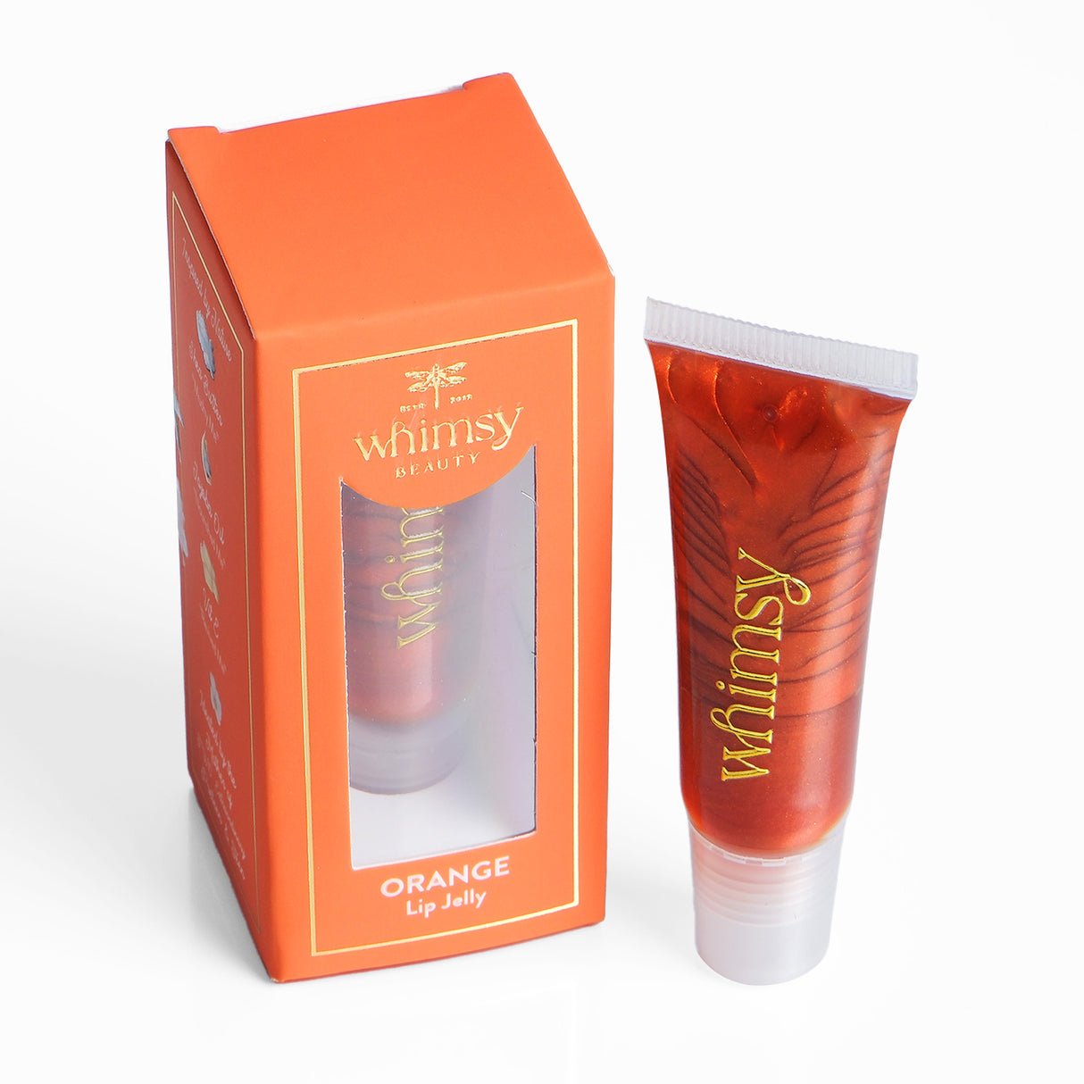 Orange lip jelly with packaging labeled 'whimsy beauty' on a white background