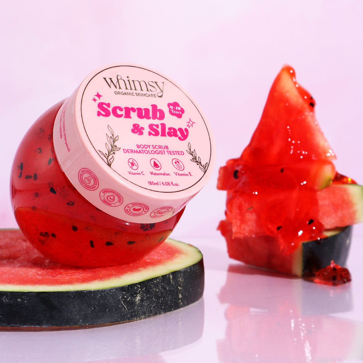 Whimsy Scrub & Slay body scrub with watermelon slices on a white background