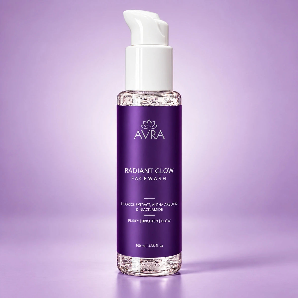 A bottle of AVRA Radiant Glow Facewash with a white pump dispenser and a purple label, set against a solid lavender background.