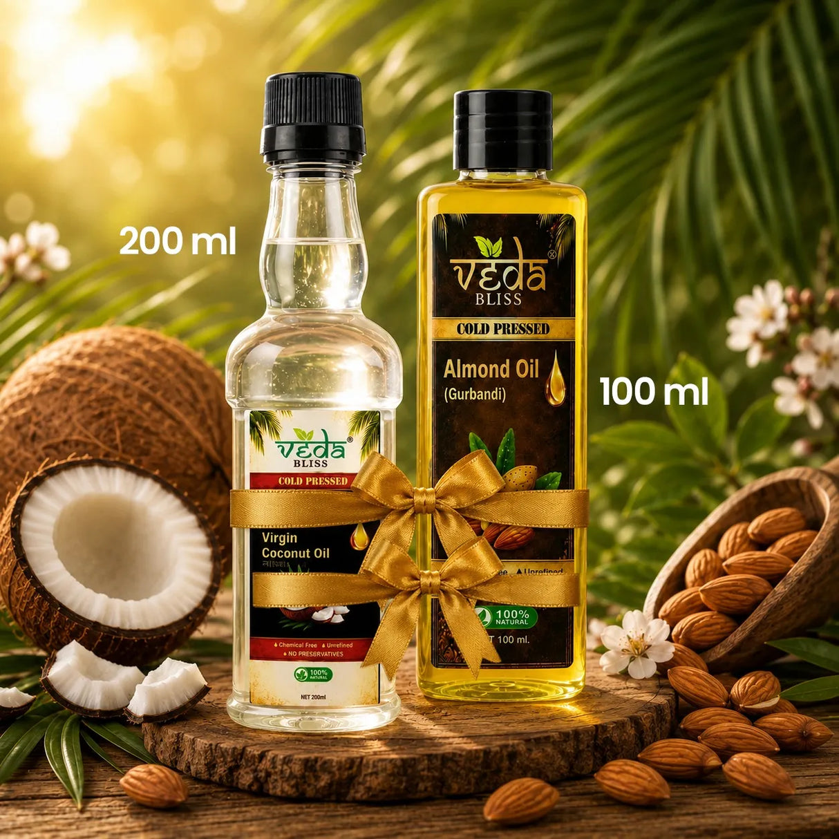 Two bottles of Reda Bliss organic coconut 200ml and almond oils 100ml