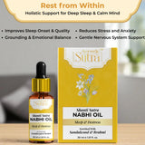 Shanti Sutra Nabhi Oil bottle and packaging on a wooden surface with a blurred background