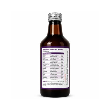 Bottle of Ayurvedic medicine with a purple label on a white background
