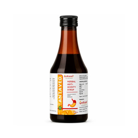 Bottle of herbal anti-acidity syrup on a white background