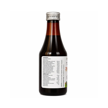 Bottle of syrup with a label on a white background