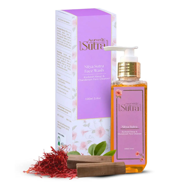 Niva Sutra face wash bottle and packaging with saffron and wooden block on a white background