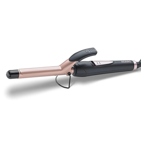 Rose gold and black hair straightener on a white background