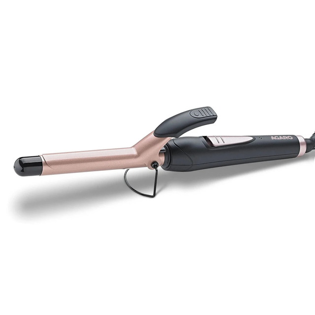 Rose gold and black hair straightener on a white background