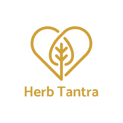 Gold logo of Herb Tantra with a heart-shaped design and leaf inside on a white background