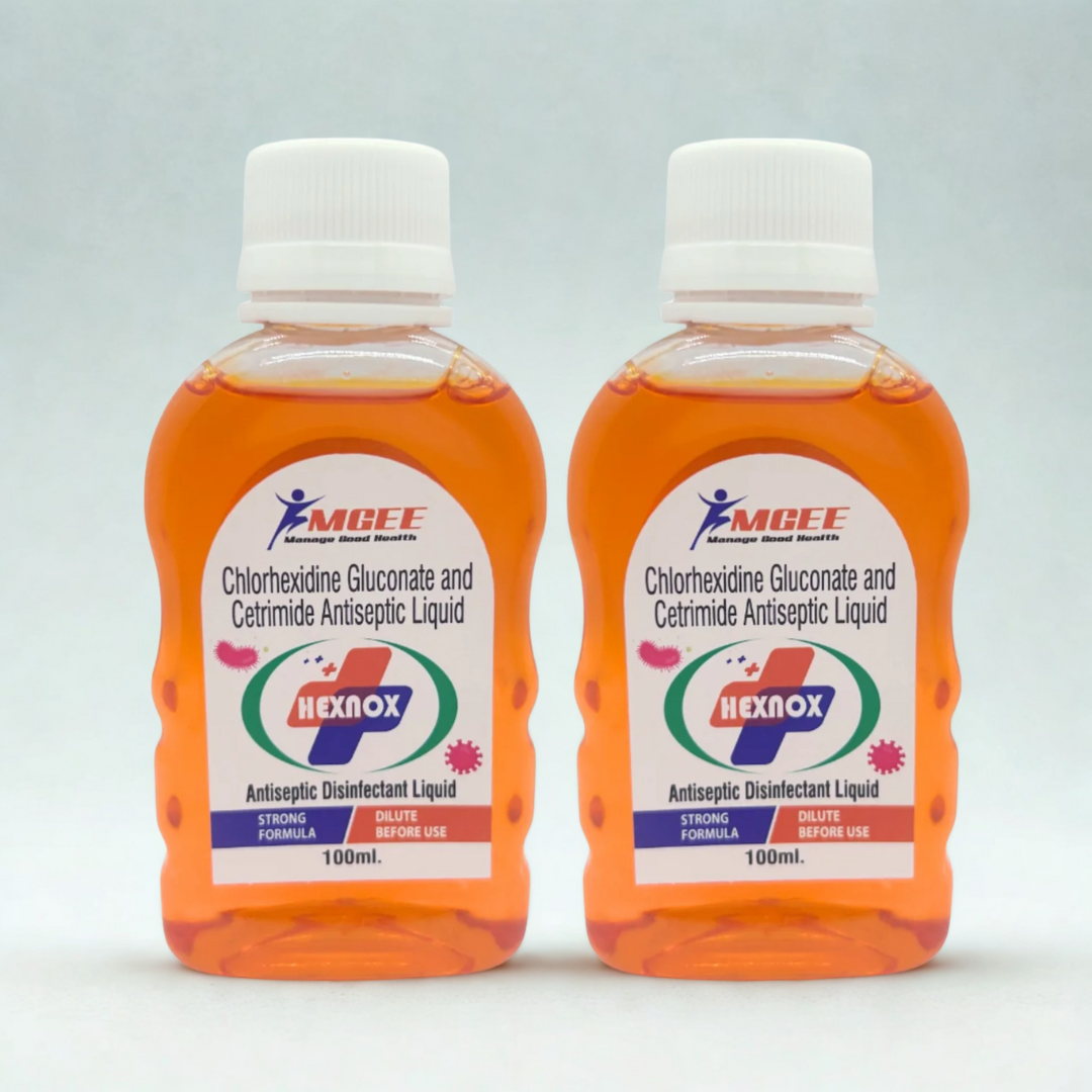 Two bottles of Hexnox antiseptic liquid on a light gray background