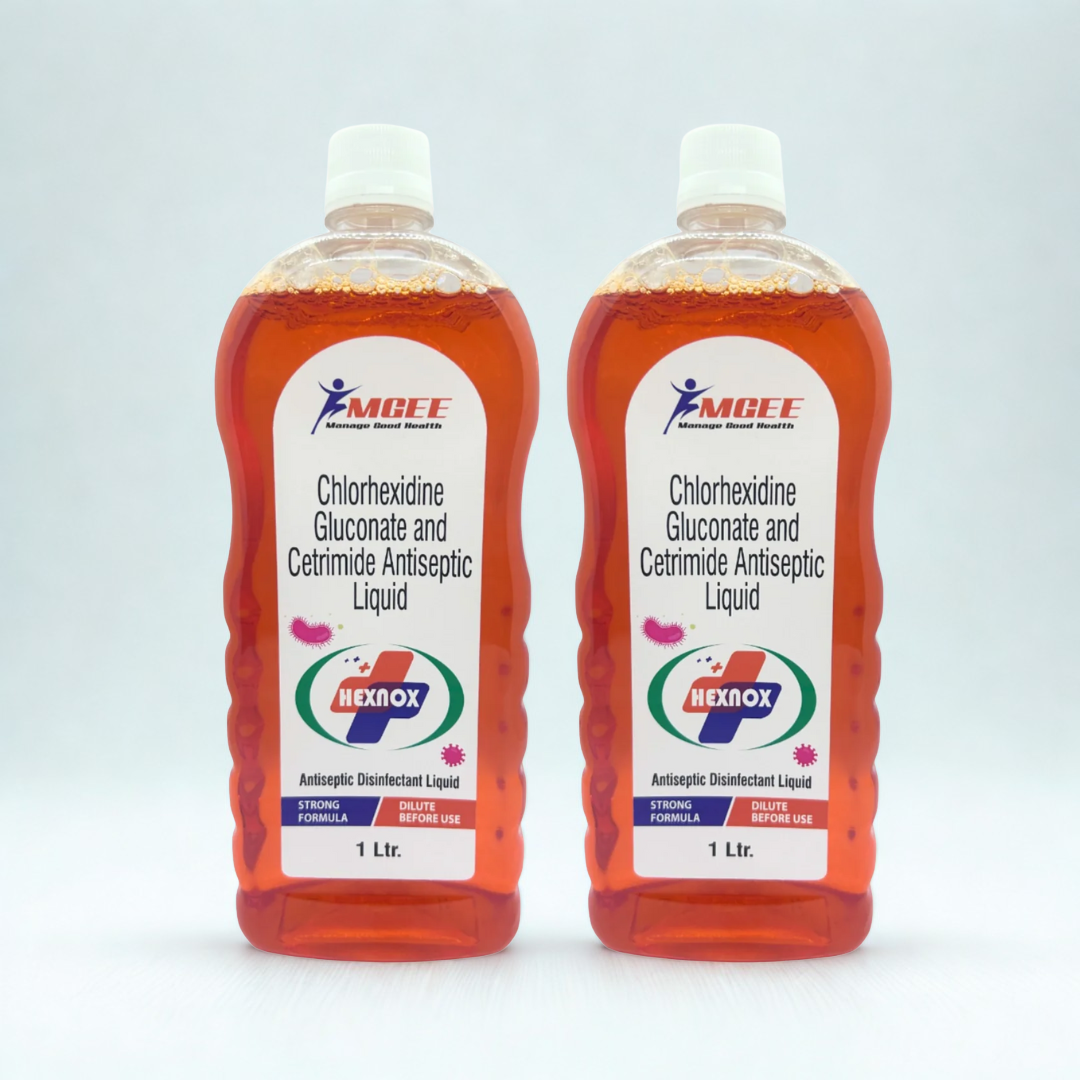Two bottles of Rexnord antiseptic liquid on a white background