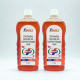Two bottles of Rexnord antiseptic liquid on a white background