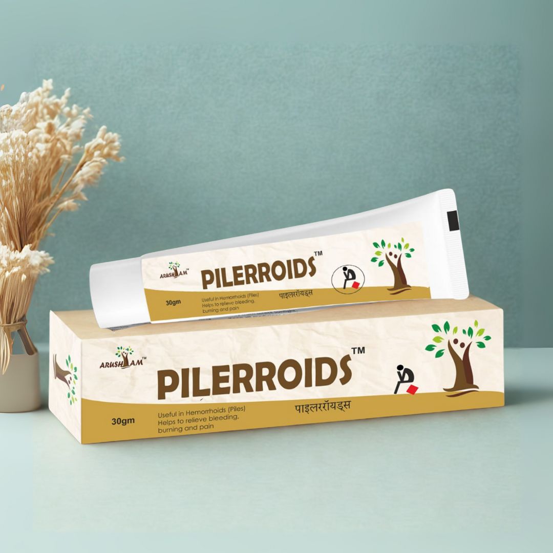 Pillerroids packaging on a light blue background with decorative elements.