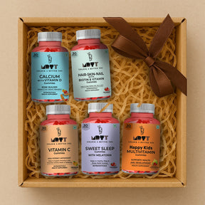 Box of Mott+Boys vitamins with a brown ribbon on a beige background