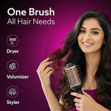 Woman using a hair styling tool with text 'One Brush All Hair Needs' on a purple background