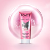 Pond's Bright Beauty face wash tube on a pink background