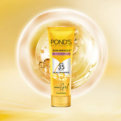 Pond's Sun Miracle sunscreen gel tube on a yellow background