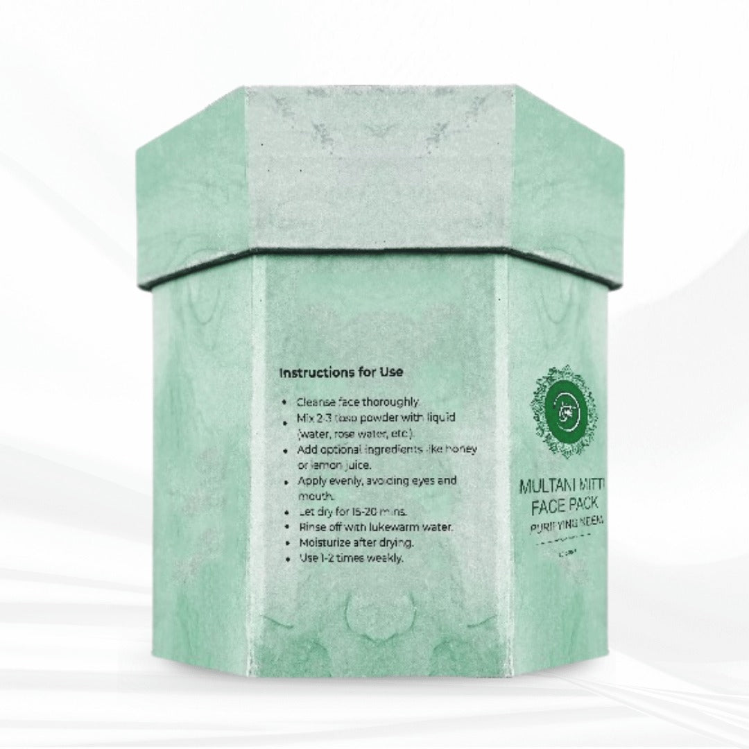 Green face pack box with instructions on a white background