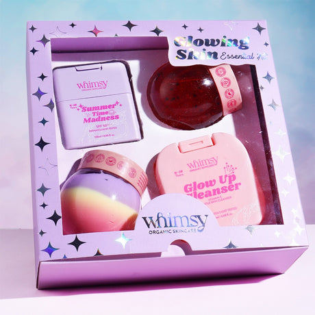 Whimsy skincare product set in a decorative box with a gradient background