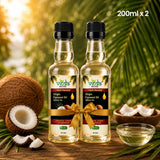 Two bottles of Veda Naturals Virgin Coconut Oil