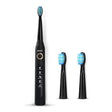 Black electric toothbrush with three brush heads on a white background