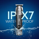 hair trimmer with water splashes on a blue background, highlighting IPX7 waterproof feature.