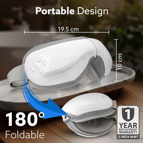 Foldable white and gray device with measurements and warranty information on a blurred background