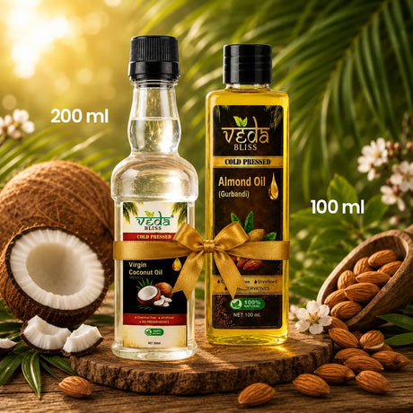 Two bottles of Redda Bliss cold pressed oils, a 200 ml bottle of Virgin Coconut Oil and a 100 ml bottle of Almond Oil (Gurbandi)